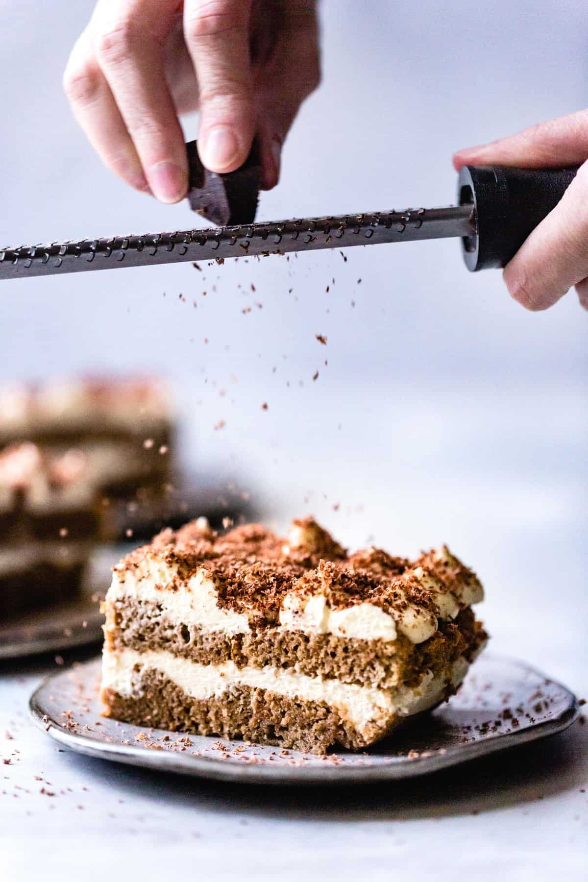 grating chocolate over gf tiramisu