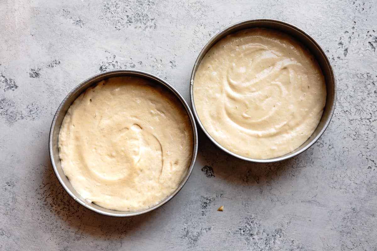 unbaked cakes in pans for gluten-free layer cake