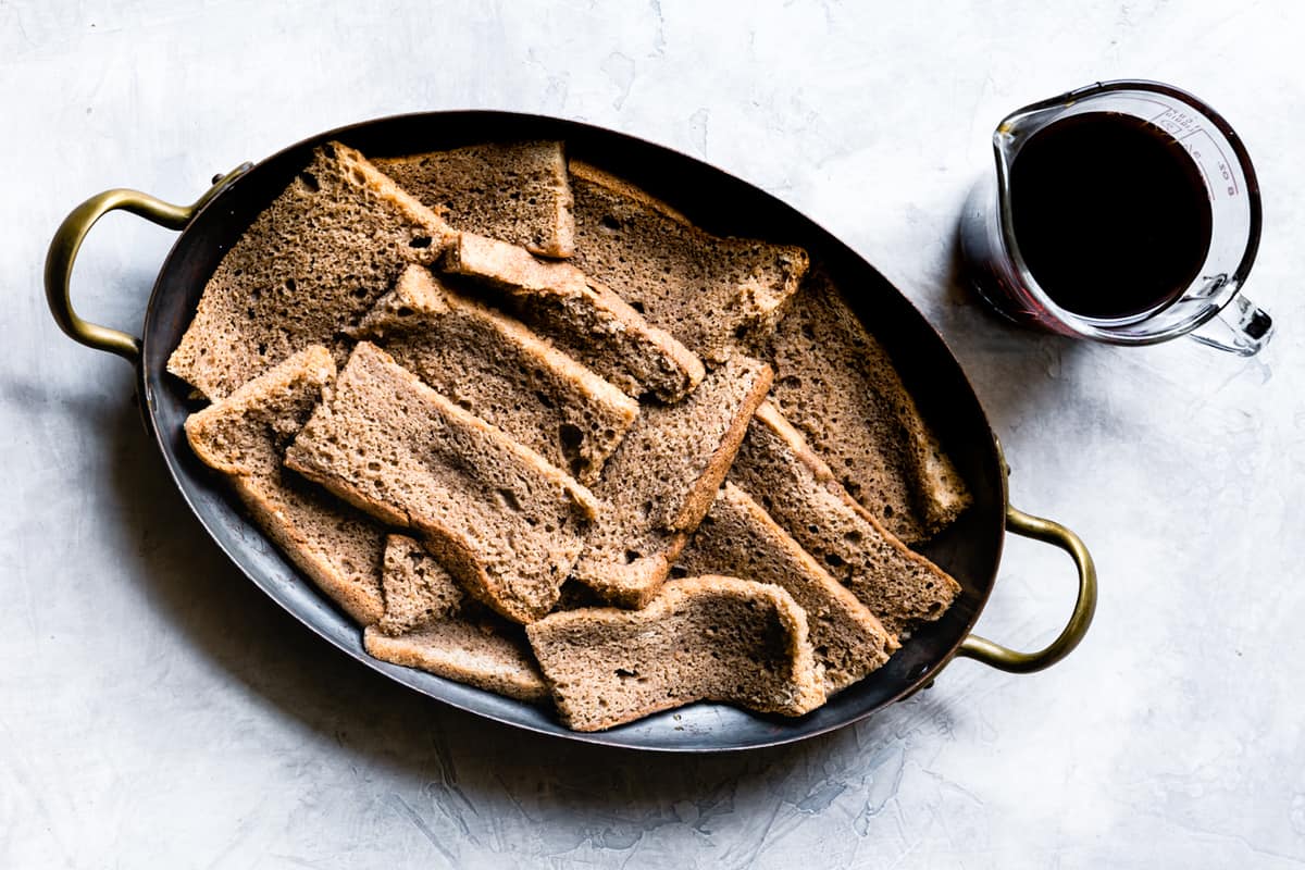 soaking cake slices with coffee syrup