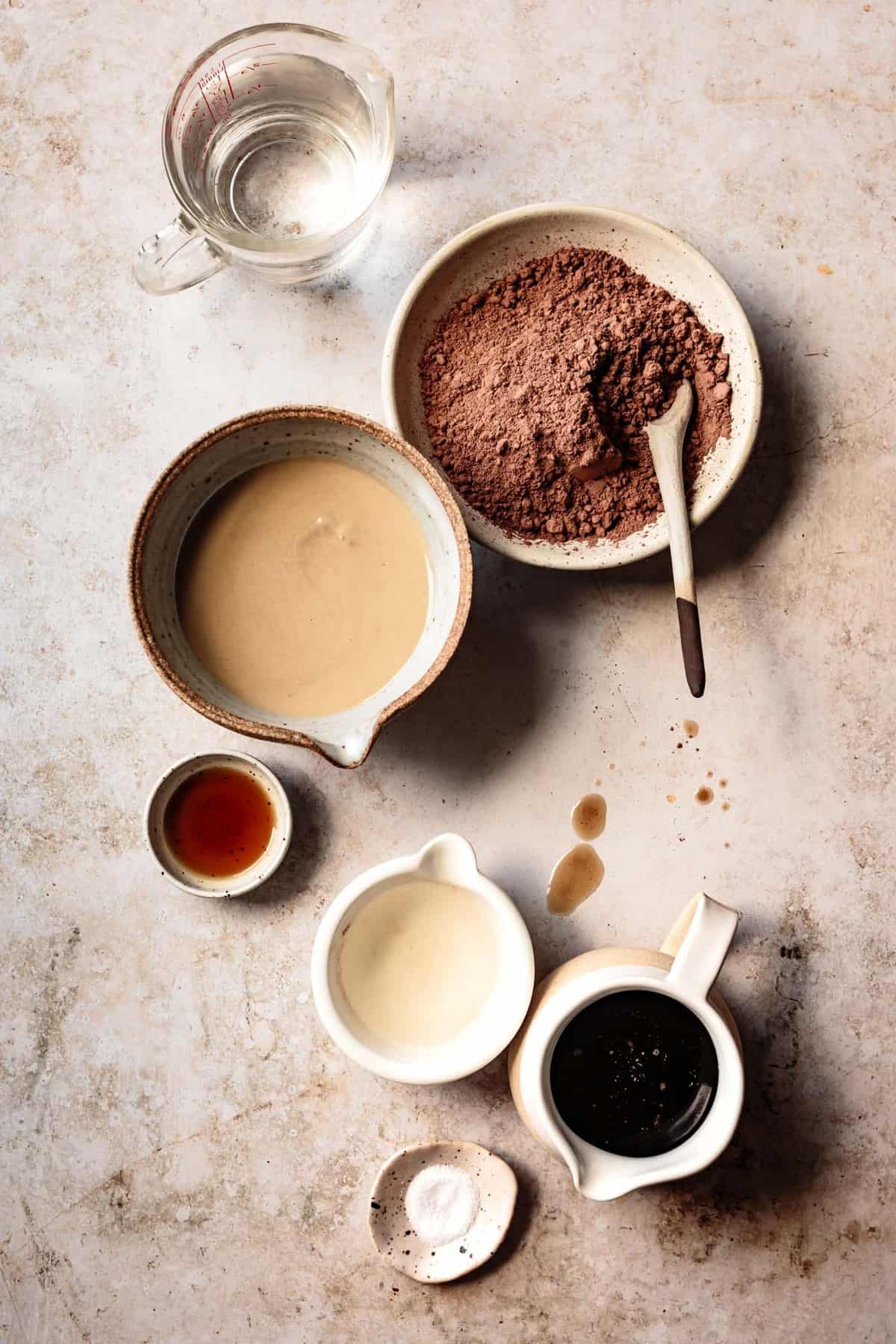 ingredients for pudding arranged on a surface 