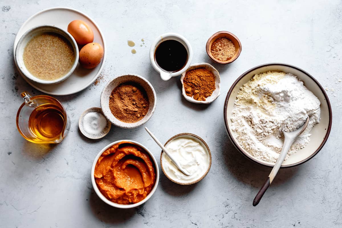 ingredients in bowls for gluten-free pumpkin muffin recipe