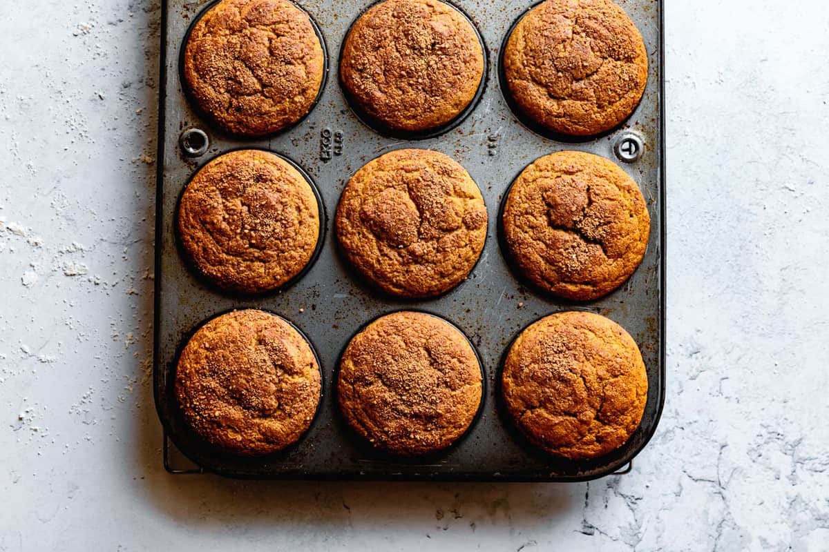 baked muffins in a vintage muffin tin