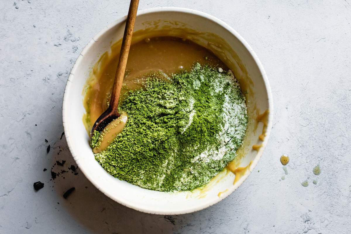 matcha and flours sifted into wet ingredients