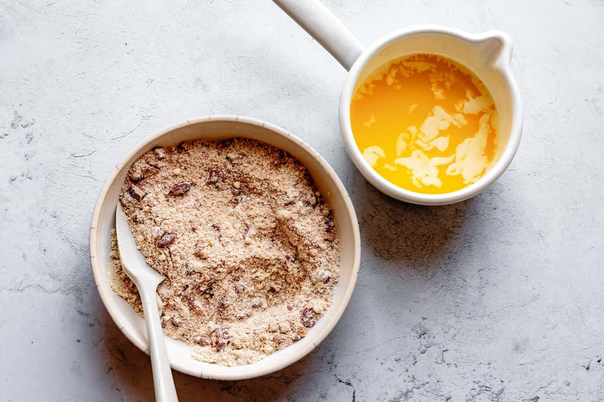 ingredients for almond flour apple crisp topping: dry ingredients and melted butter