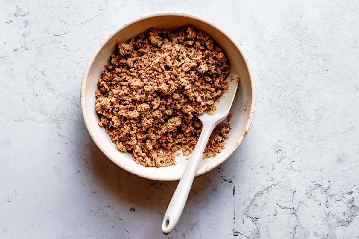 almond flour crumble topping, stirred in a bowl