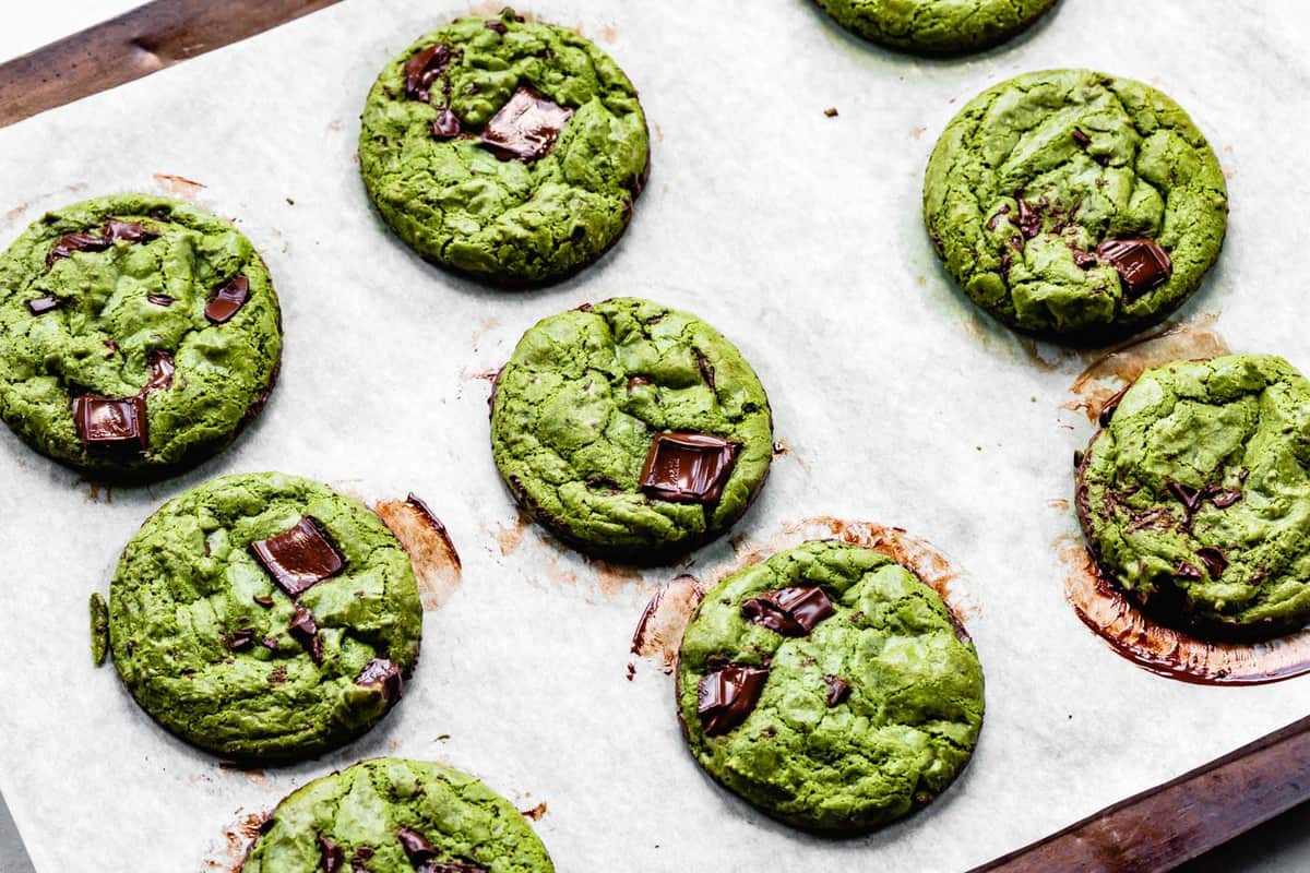 baked green tea chocolate chip cookies on a baking sheet
