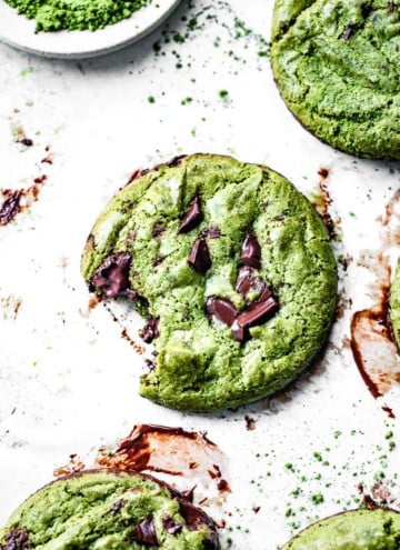 matcha chocolate chip cookie on a piece of parchment
