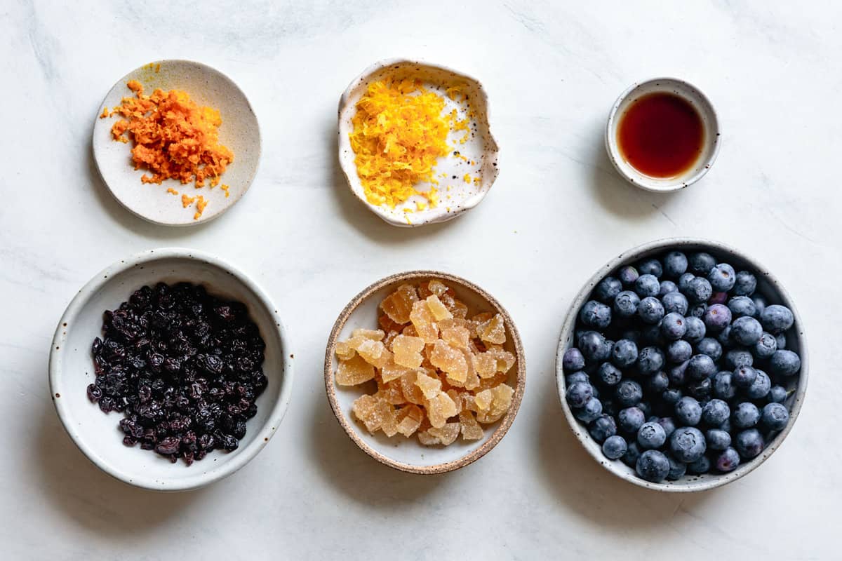 three different flavors for scones arranged on marble