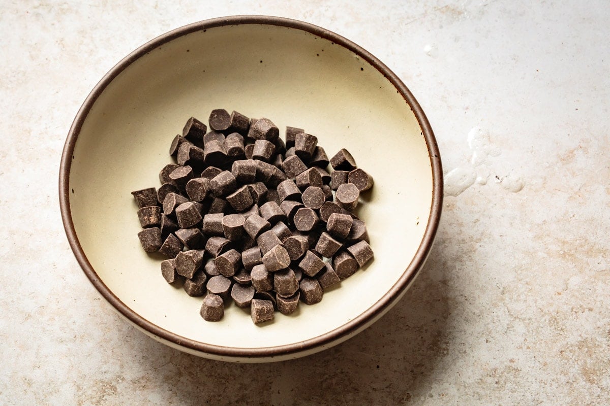 chocolate chunks in a stoneware bowl