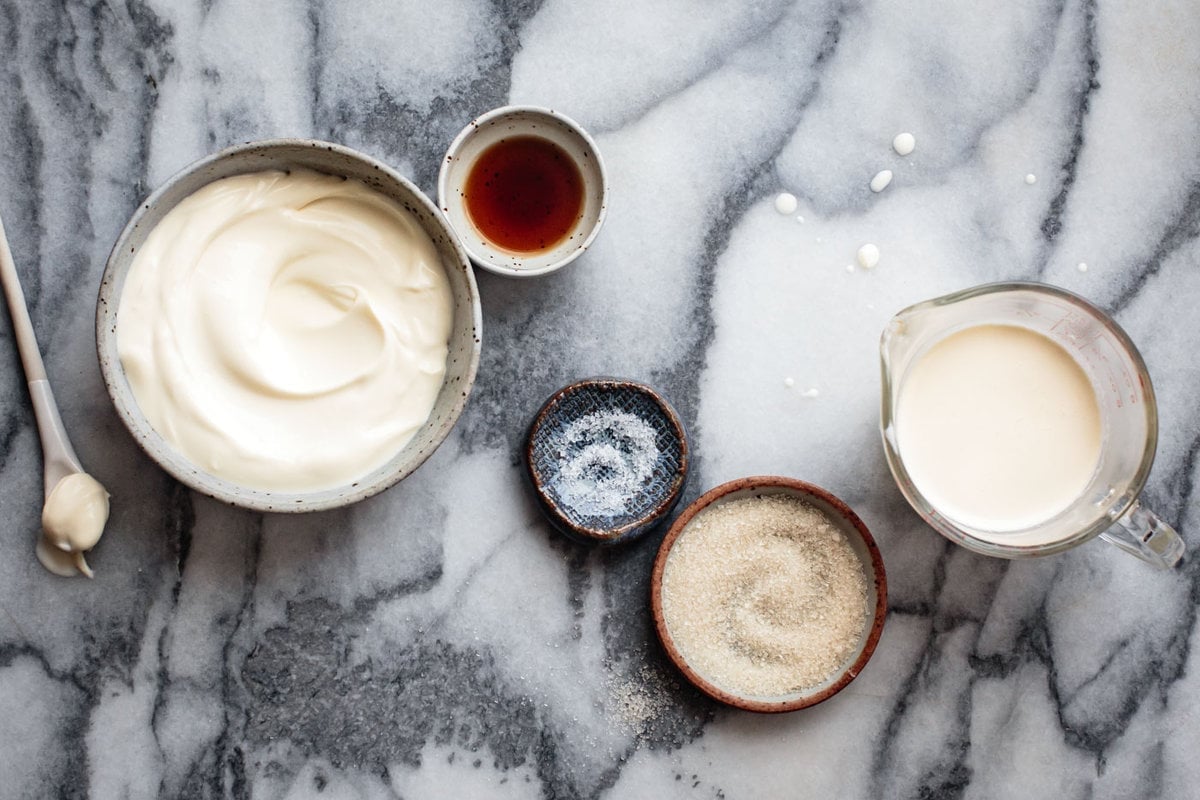 mascarpone and other ingredients arranged on a marble countertop