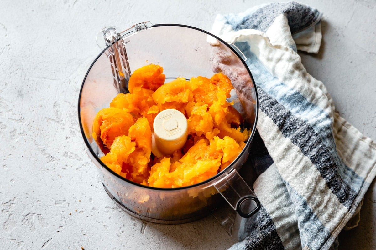 the roasted squash flesh is in the food processor waiting to be pureed