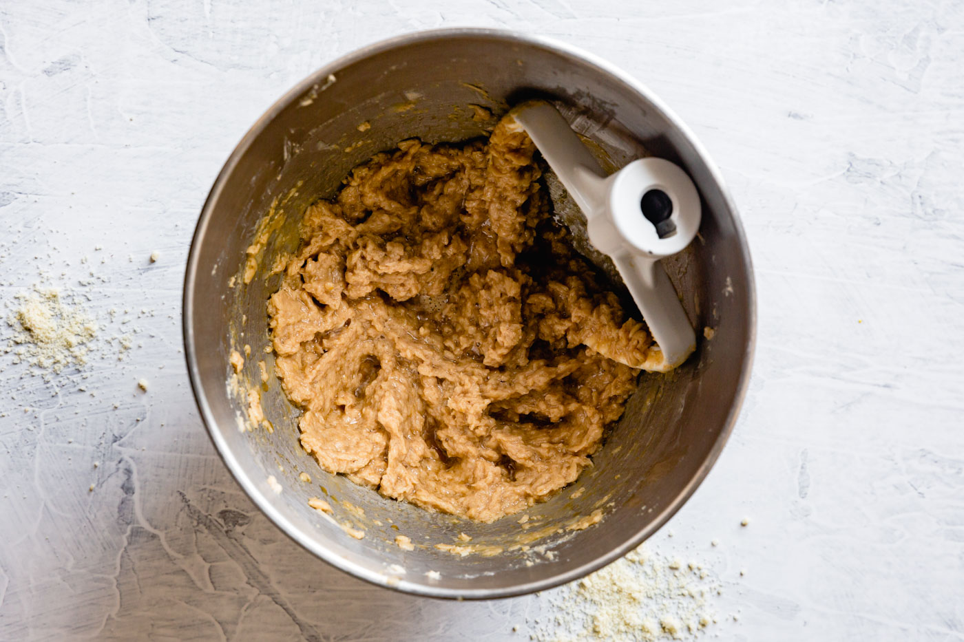 the egg-butter-sugar mixture is in the mixing bowl