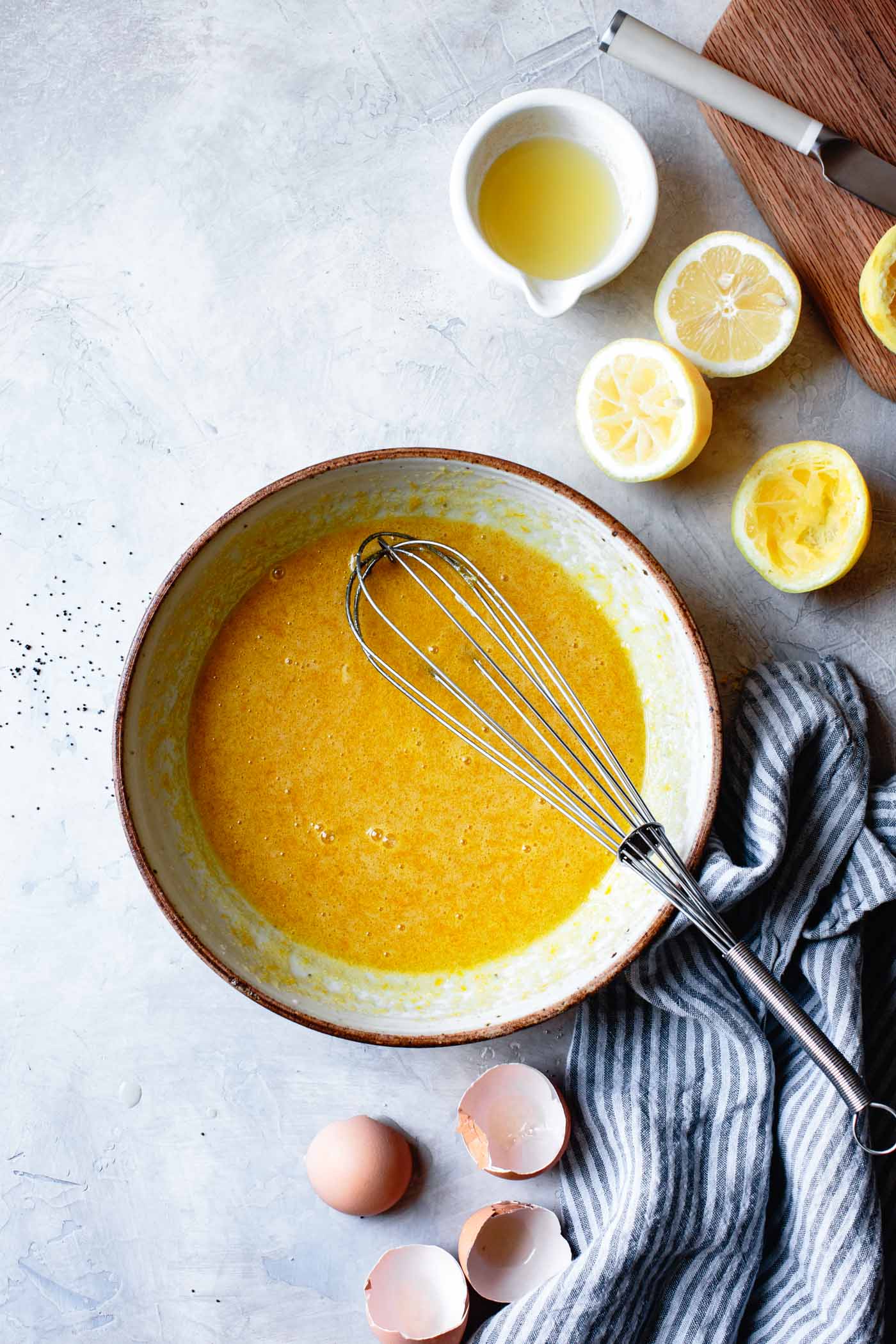 The eggs and lemon sugar have been whisked together in a bowl