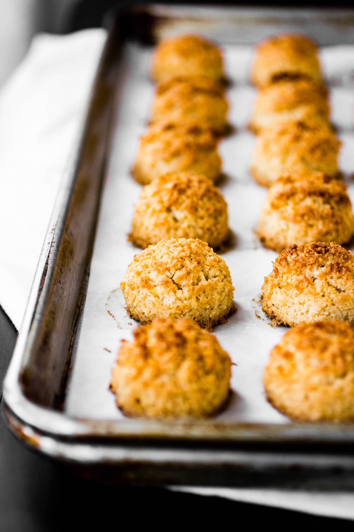 Baked macaroons have golden, craggy tops 