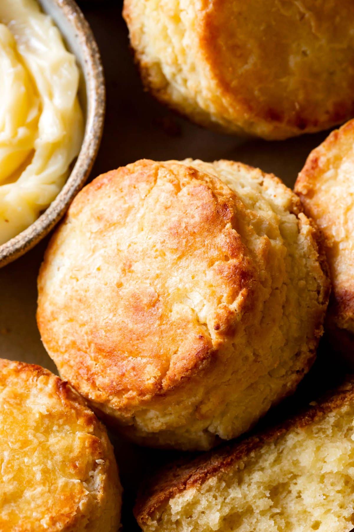 golden, buttery biscuits are lounging in a bowl