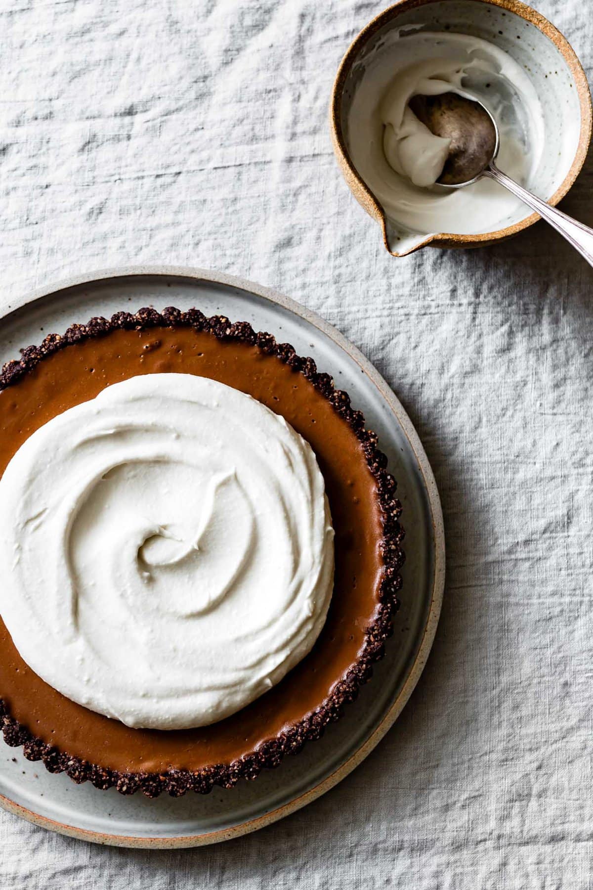 Whipped topping on a chocolate tart