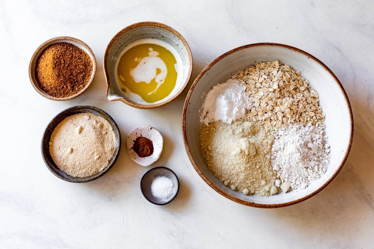 almond flour crumble ingredients are arranged on a surface