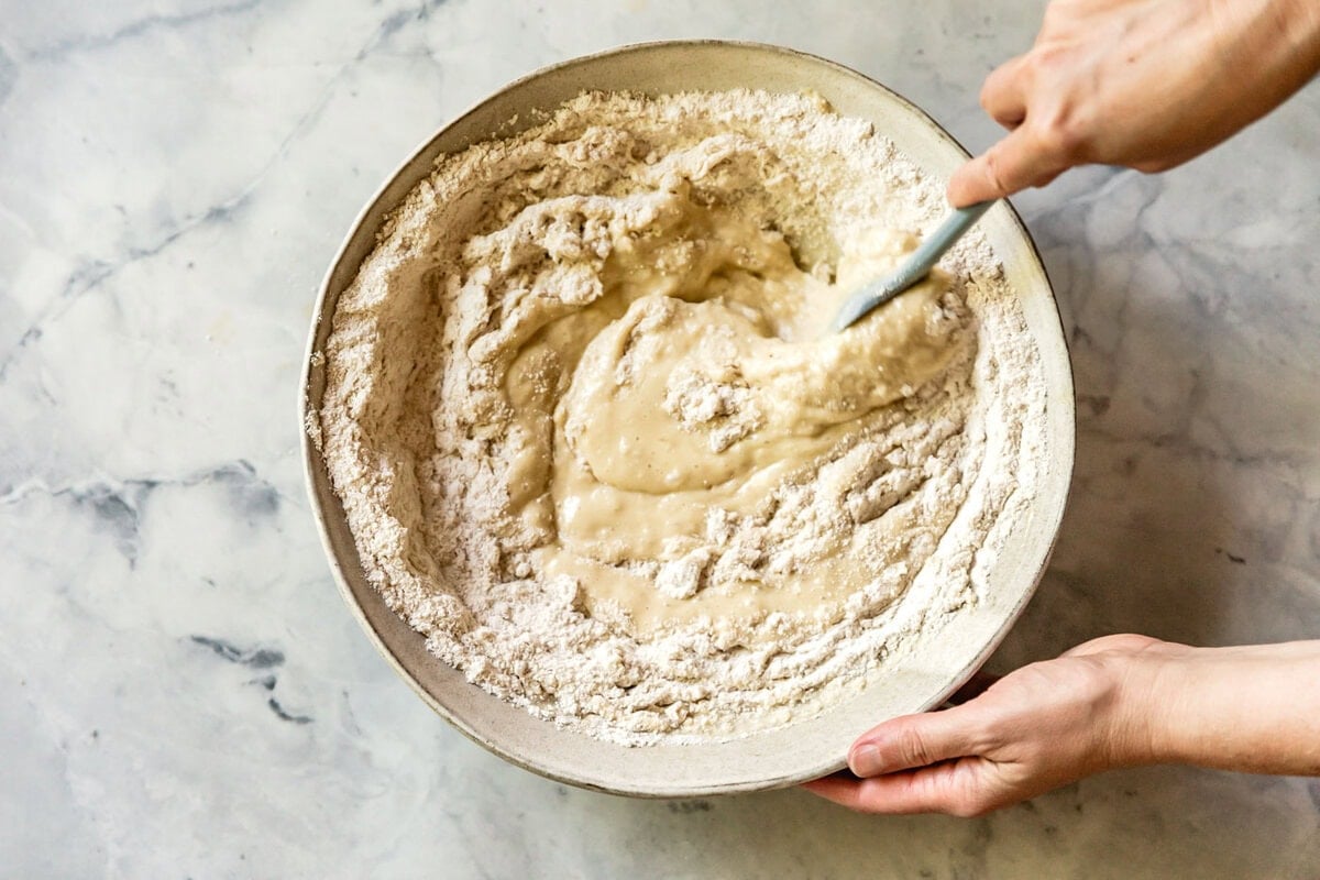 stirring the flours into the batter
