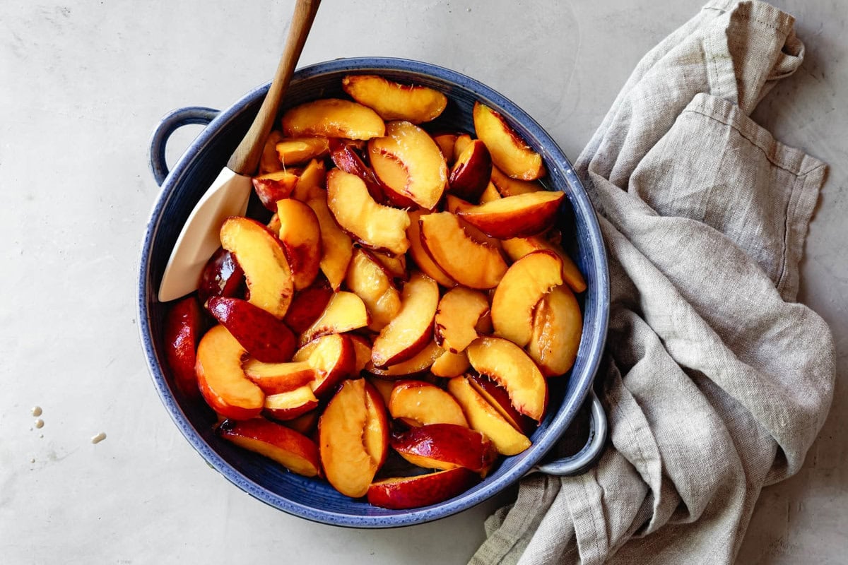 prepped peaches in a pan