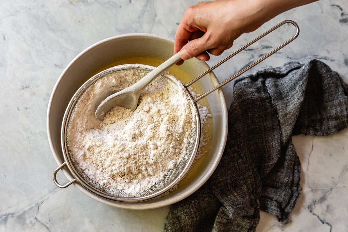 sifting the dry ingredients